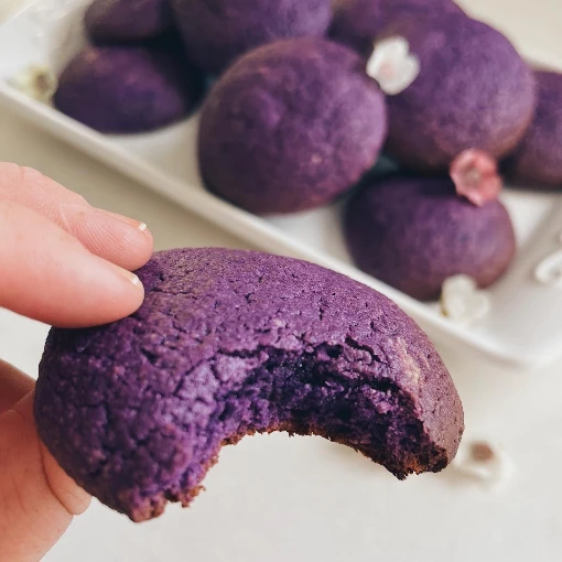 Purple cookies with a bite in one